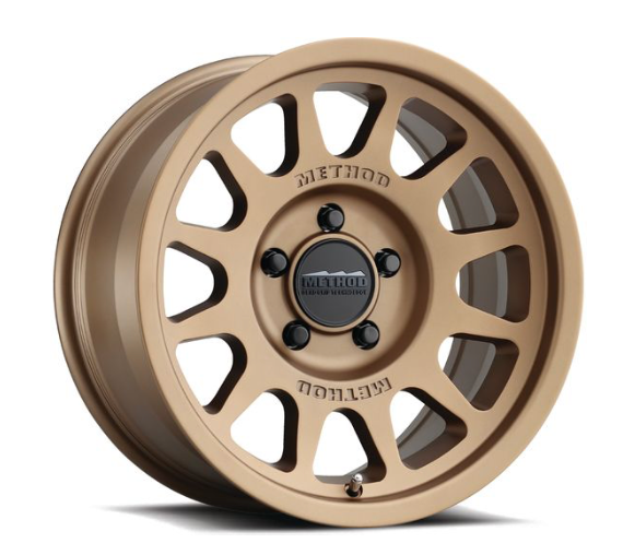 MR703 BEAD GRIP 17X9 12MM OS 5X5 71.5MM CB METHOD BRONZE (Check Description For Vehicles This Fits)