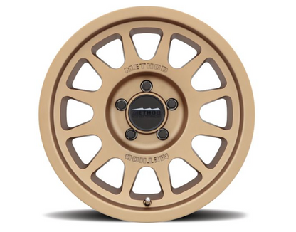 MR703 BEAD GRIP 17X9 12MM OS 5X5 71.5MM CB METHOD BRONZE (Check Description For Vehicles This Fits)